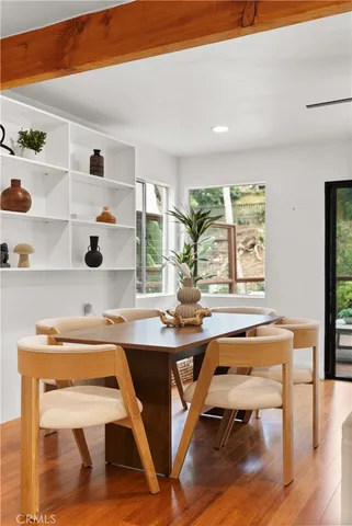 a room with furniture and wooden floor