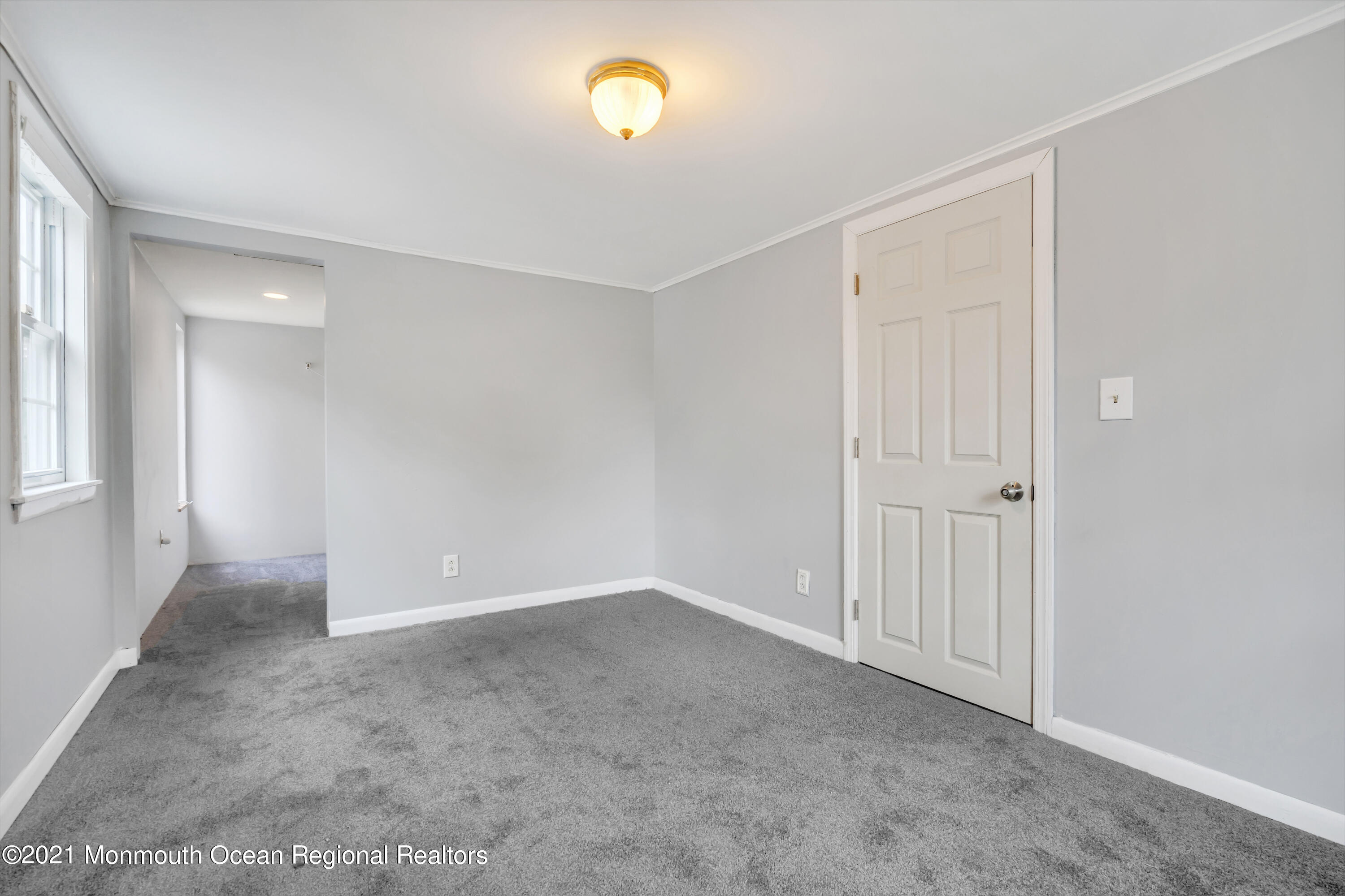 157 Howell Road Freehold, NJ 07728 - Photo 22 of 33 an empty room with windows and closet