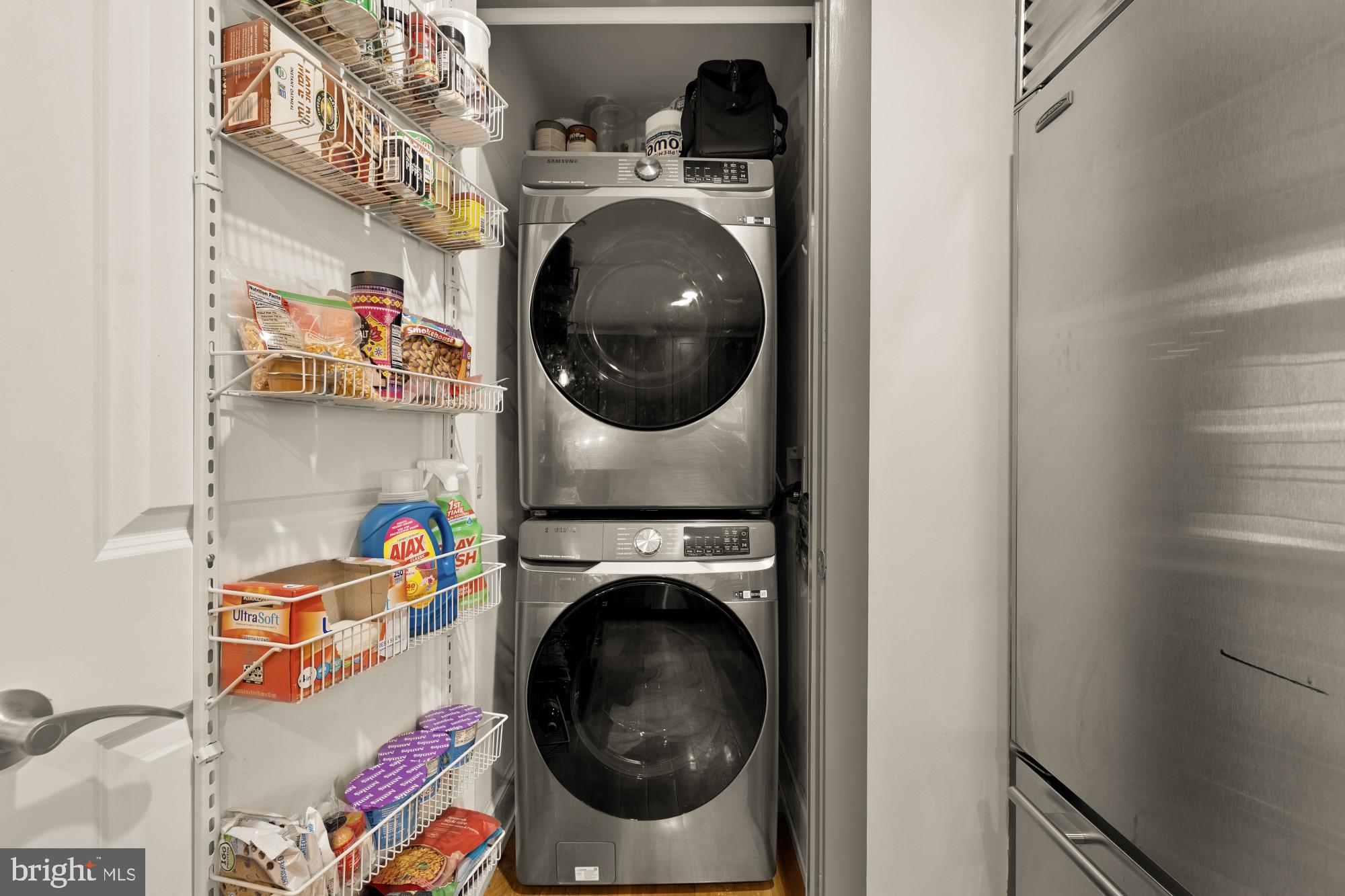 215 I Street Northeast, Unit 311 Washington, DC 20002 - Photo 12 of 38 a utility room with dryer and washer