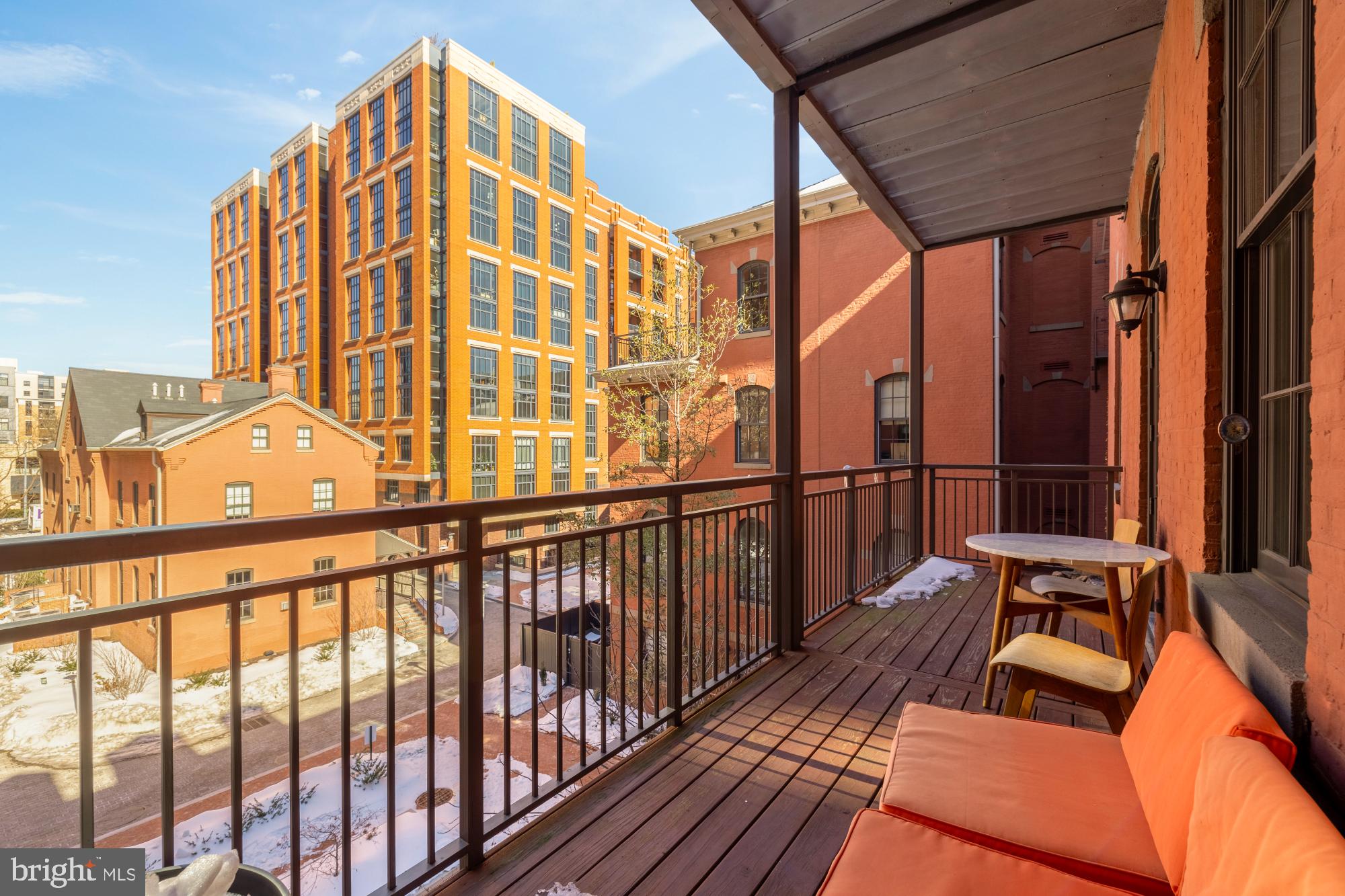 215 I Street Northeast, Unit 311 Washington, DC 20002 - Photo 25 of 38 a view of balcony with wooden floor and outdoor seating