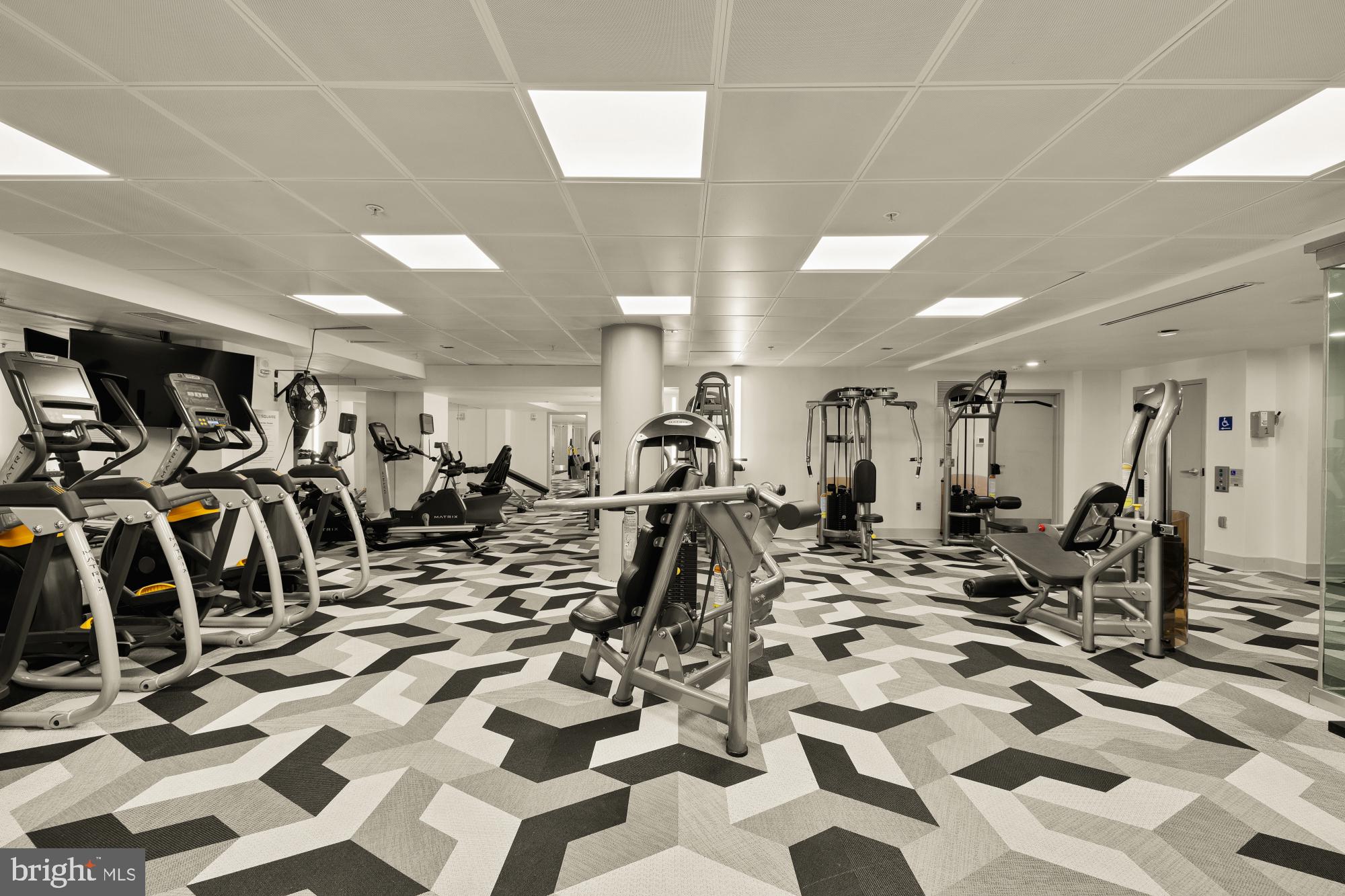 215 I Street Northeast, Unit 311 Washington, DC 20002 - Photo 30 of 38 a view of a room with gym equipment