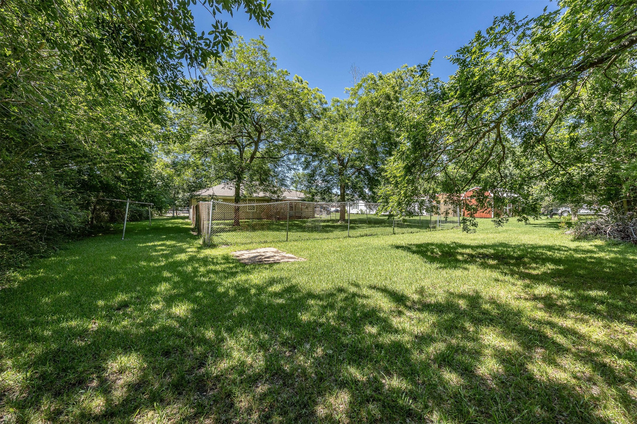 502 Massey Tompkins Road Baytown, TX 77521 - Photo 29 of 32 a garden view with a trees