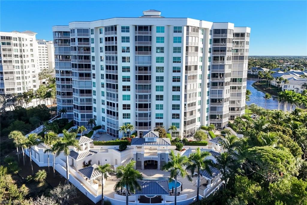 300 Dunes Boulevard, Unit 201 Naples, FL 34110 - Photo 30 of 50 a view of a building with potted plants