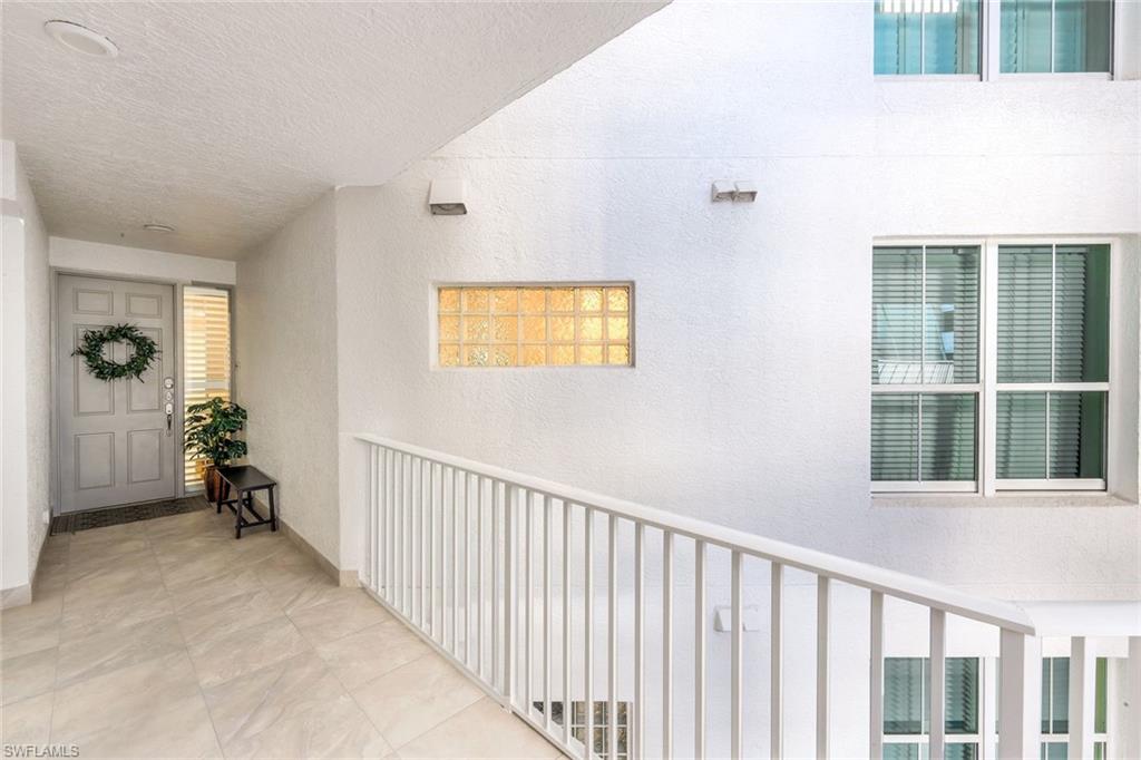300 Dunes Boulevard, Unit 201 Naples, FL 34110 - Photo 5 of 50 a view of hallway with windows