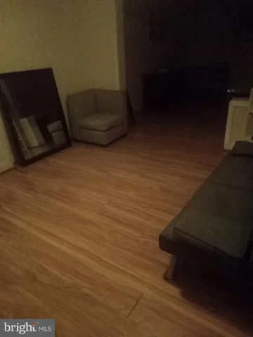 a view of kitchen and empty room