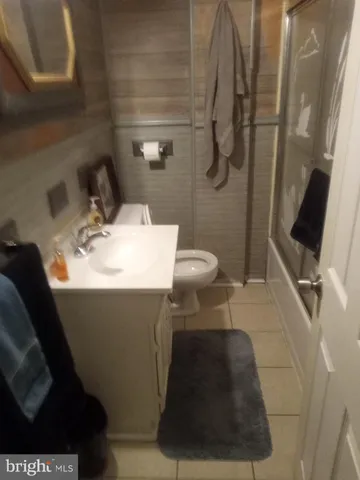 a view of livingroom with furniture wooden floor and window