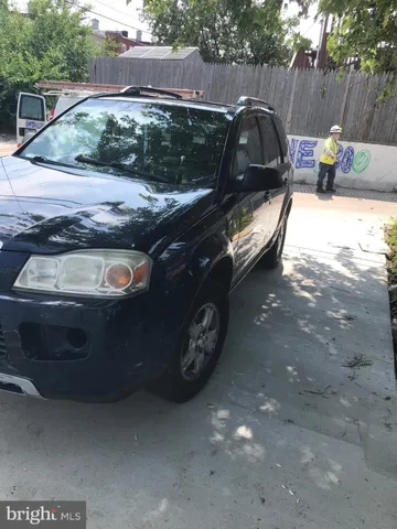 a view of a backyard with outdoor space