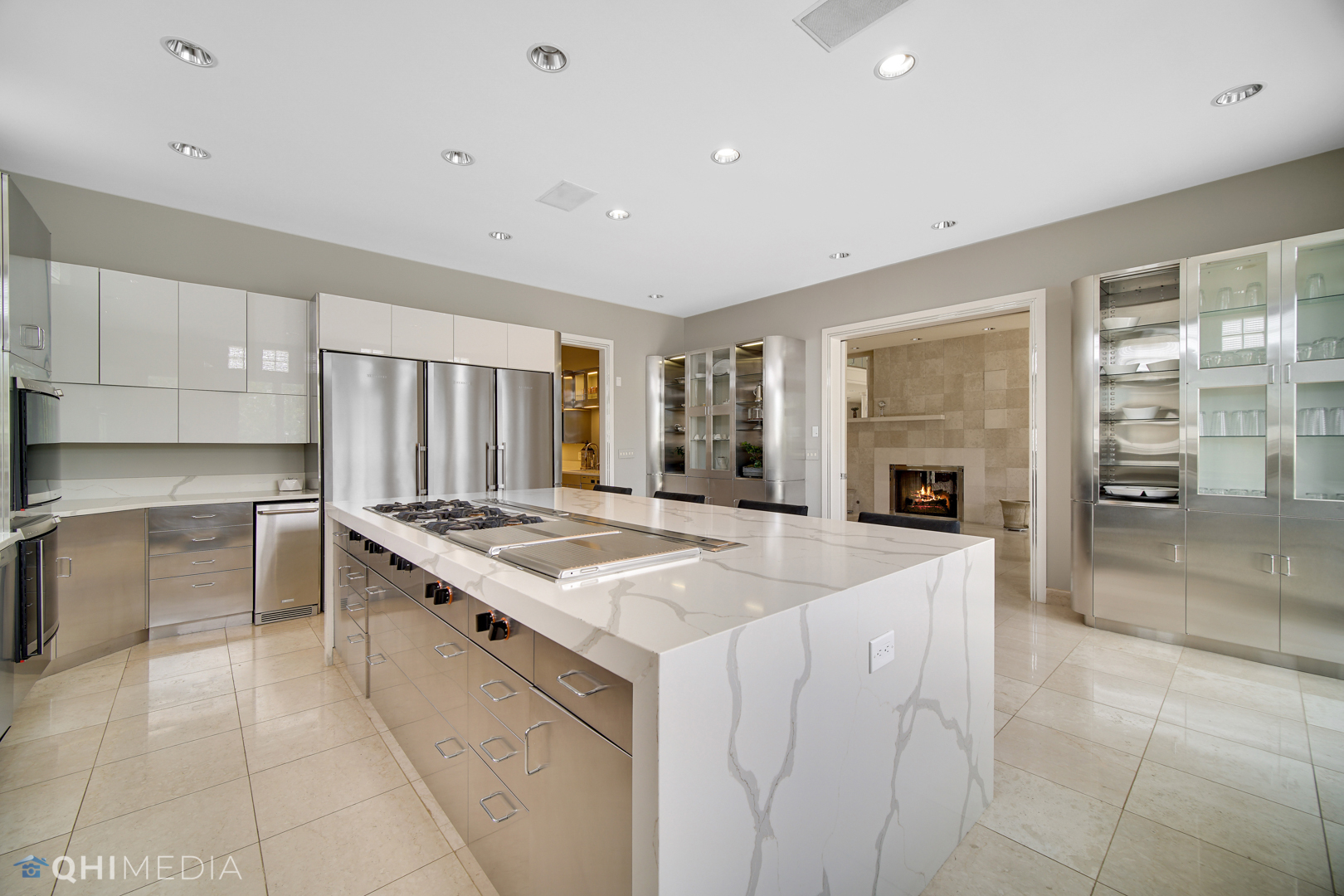 Undisclosed Address Oak Brook, IL 60523 - Photo 15 of 65 a kitchen with a stove sink and cabinets
