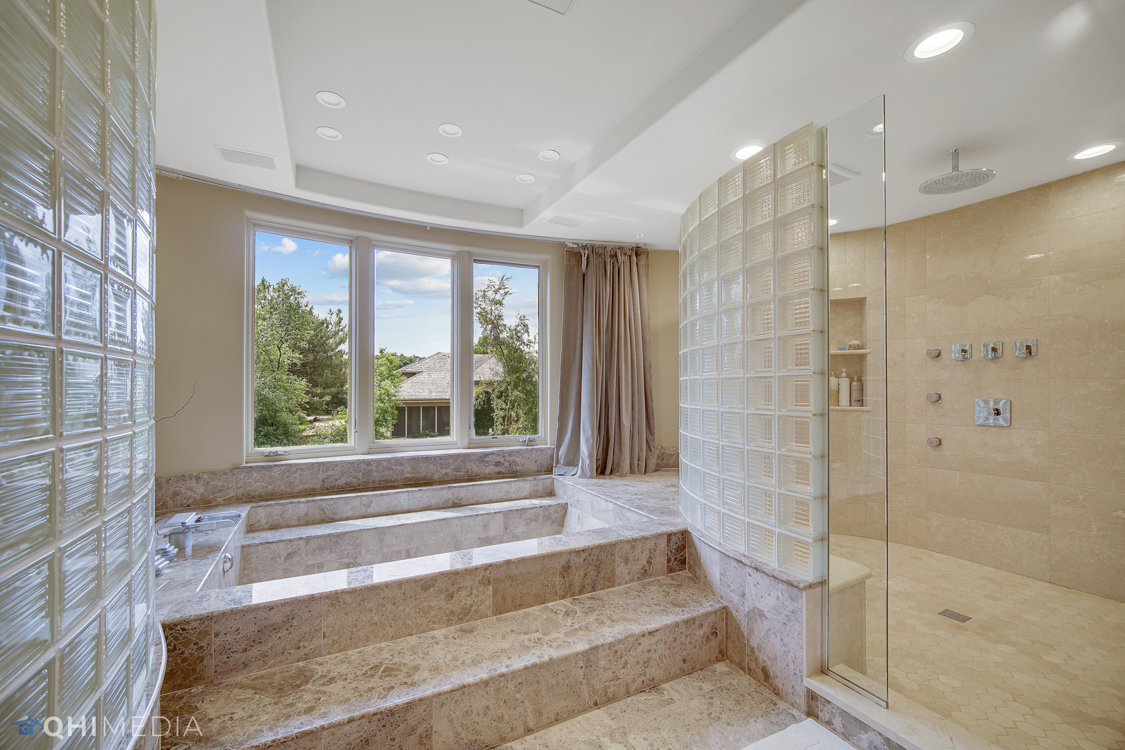 Undisclosed Address Oak Brook, IL 60523 - Photo 22 of 65 a bathroom with a bathtub and shower