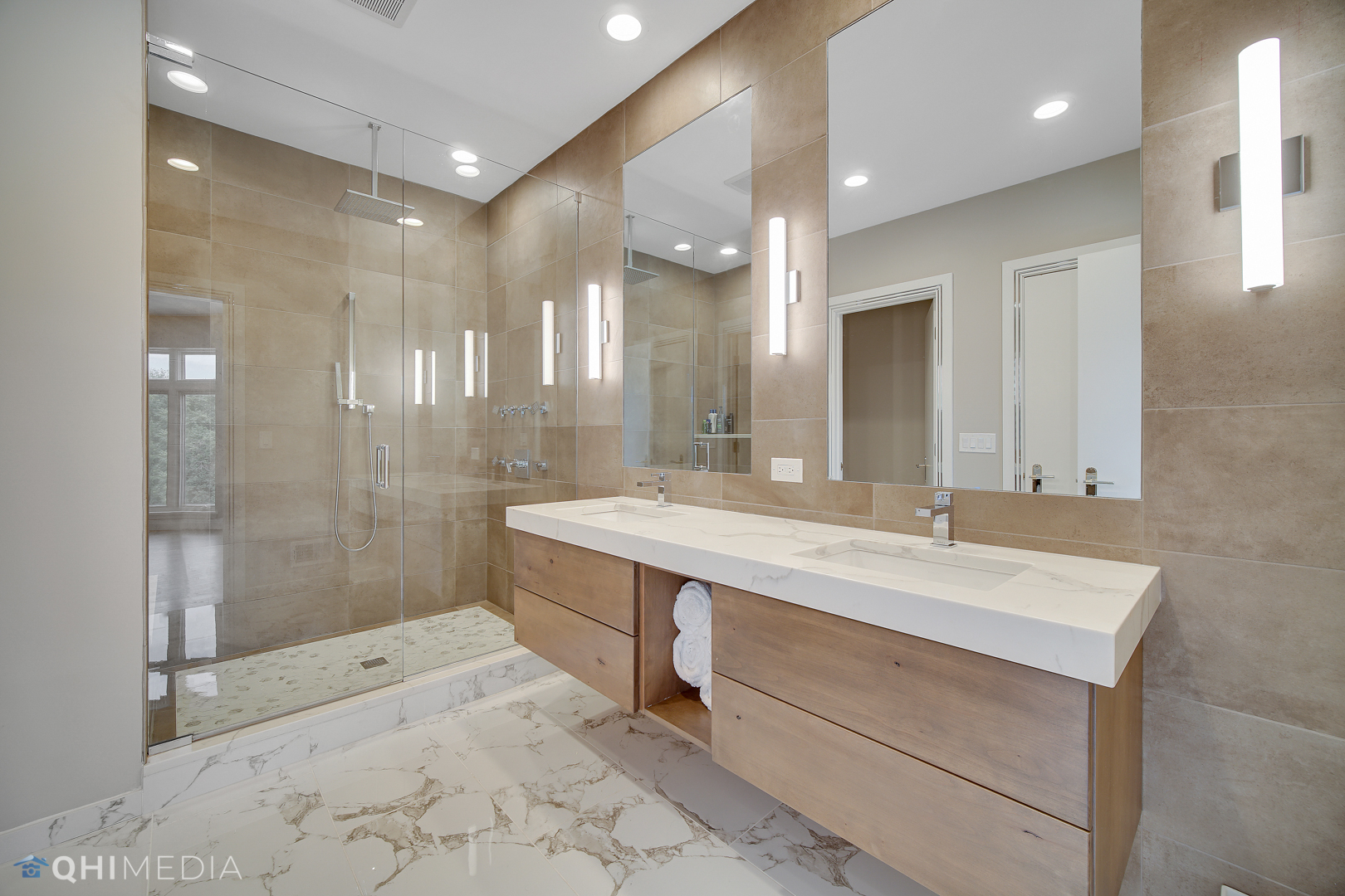 Undisclosed Address Oak Brook, IL 60523 - Photo 28 of 65 a bathroom with a sink mirror and shower