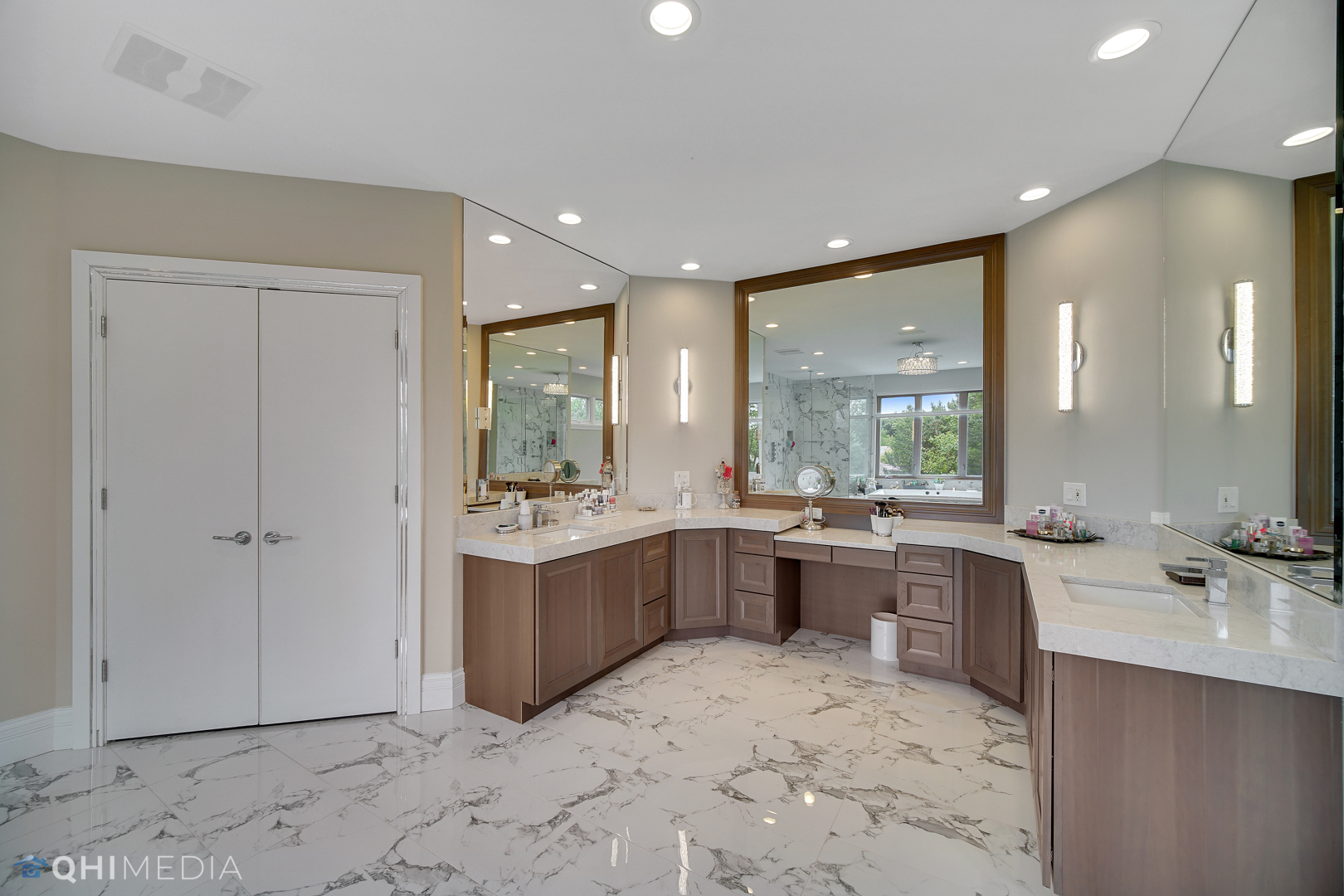 Undisclosed Address Oak Brook, IL 60523 - Photo 30 of 65 a large bathroom with a large tub and sink