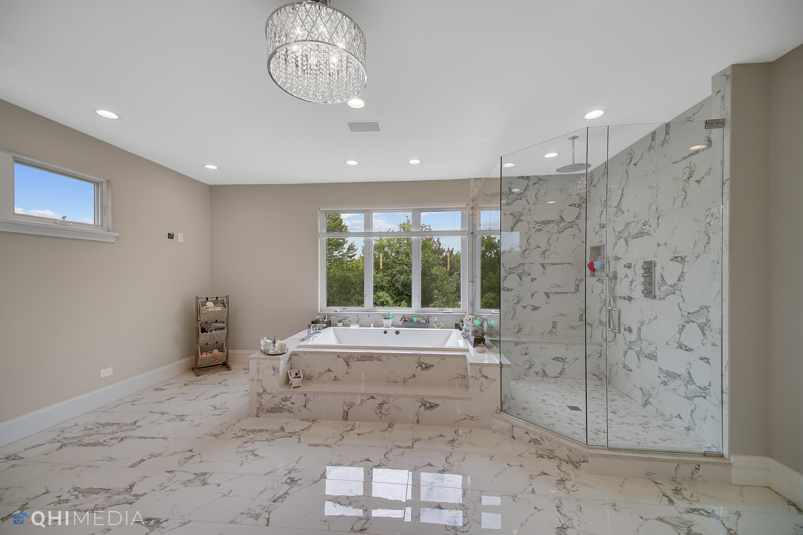 Undisclosed Address Oak Brook, IL 60523 - Photo 31 of 65 a spacious bathroom with a granite countertop sink a large mirror and shower