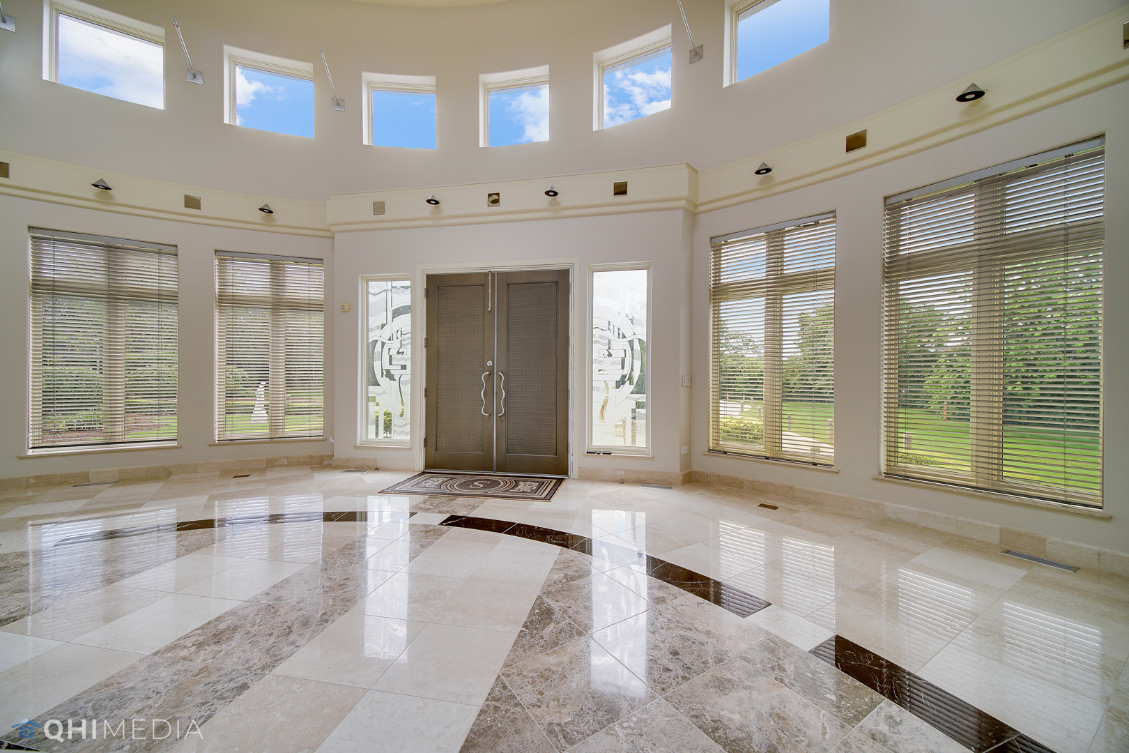 Undisclosed Address Oak Brook, IL 60523 - Photo 7 of 65 a large living room with a large window