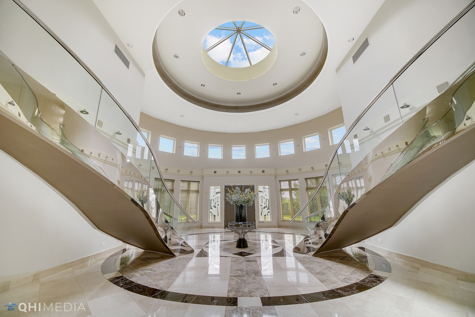 Undisclosed Address Oak Brook, IL 60523 - Photo 9 of 65 a view of entryway and hall with wooden floor
