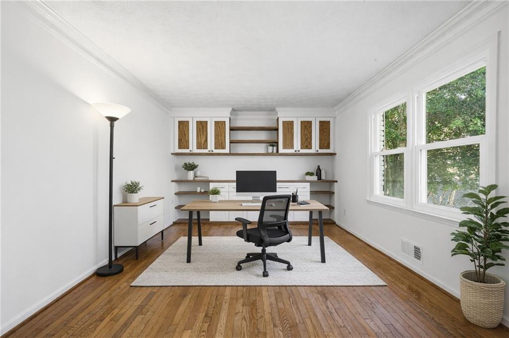130 Spring Ridge Court Roswell, GA 30076 - Photo 3 of 47 a workspace with wooden floor