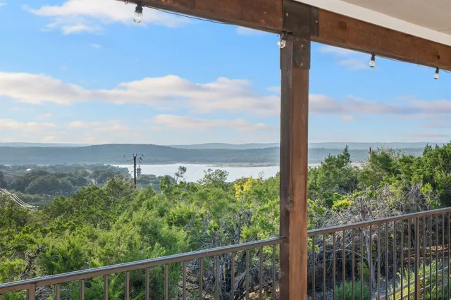 a view of a balcony with an outdoor space