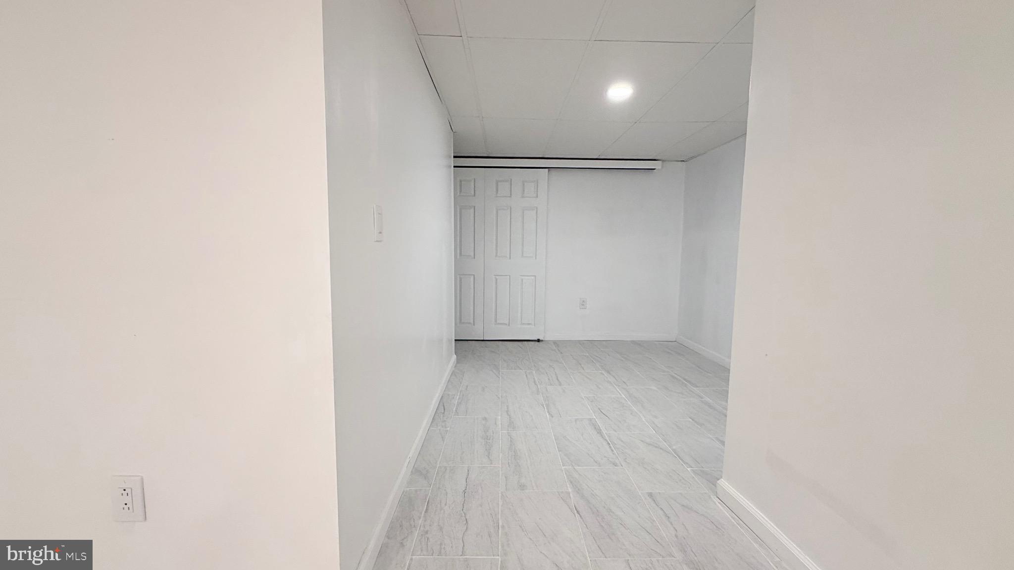 1333 Colwyn Street Philadelphia, PA 19140 - Photo 25 of 38 a view of a room with wooden floor