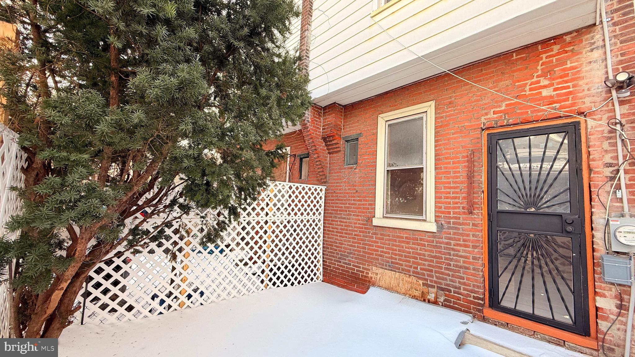 1333 Colwyn Street Philadelphia, PA 19140 - Photo 33 of 38 a front view of a house with a tree