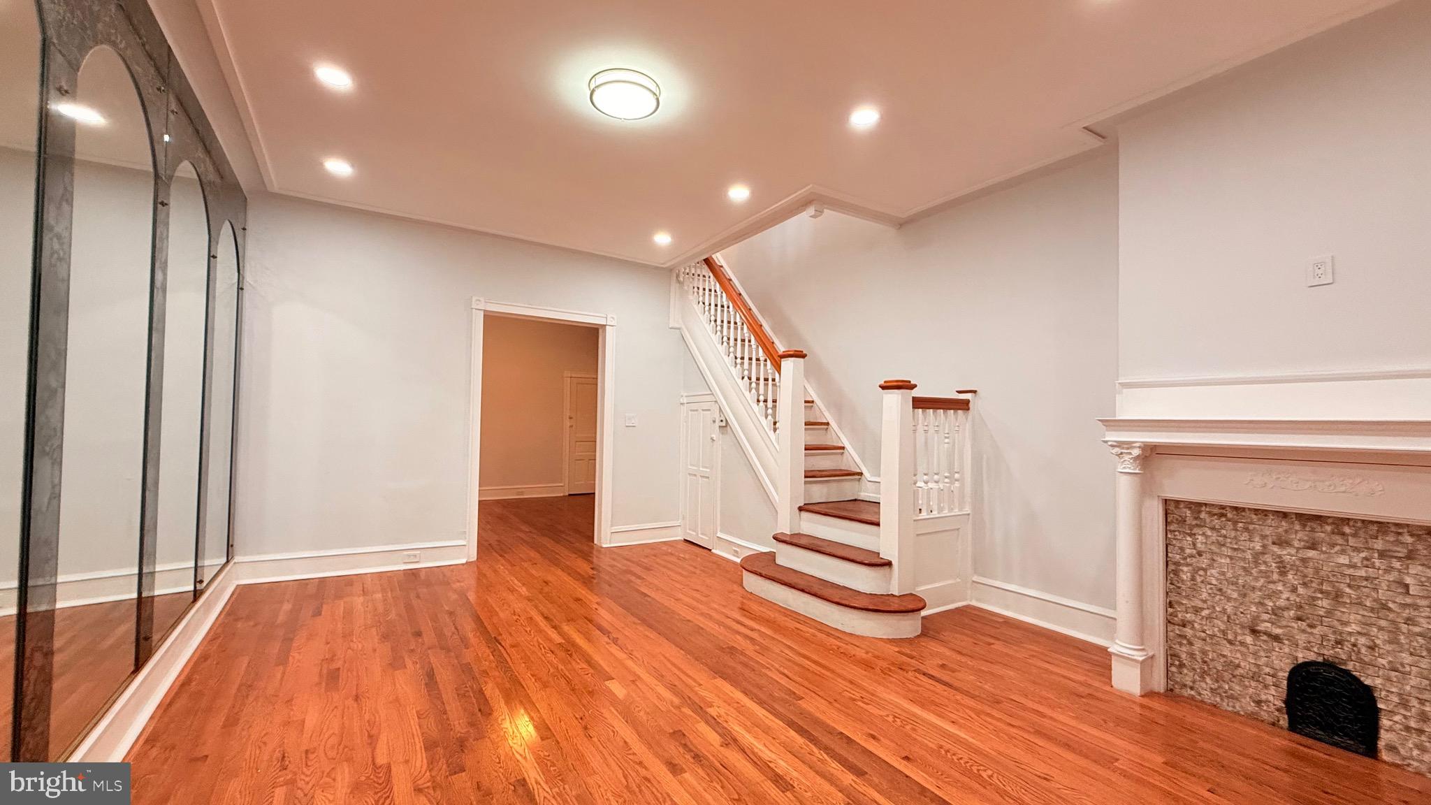 1333 Colwyn Street Philadelphia, PA 19140 - Photo 6 of 38 a view of entryway with wooden floor