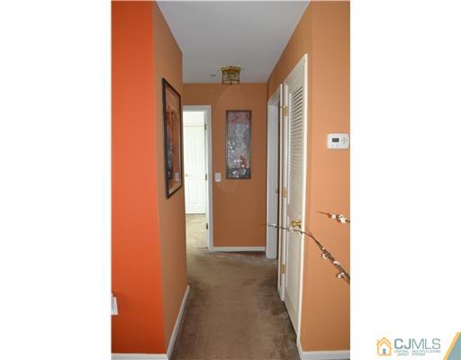 358 Rector Street, Unit 501 Perth Amboy, NJ 08861 - Photo 24 of 25 a view of a hallway with wooden floor