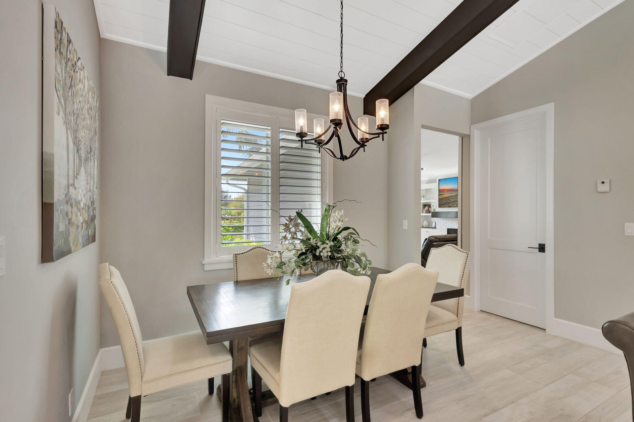 12275 185th Street North Jupiter, FL 33478 - Photo 13 of 35 a view of a dining room with furniture window and wooden floor
