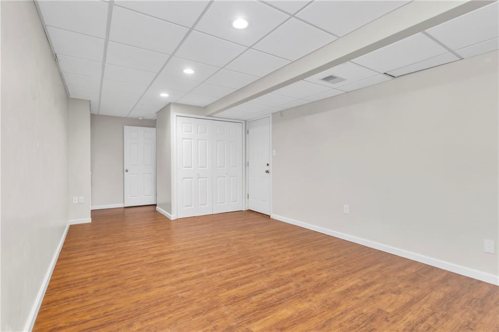 305 Broadstone Drive Mars, PA 16046 - Photo 27 of 31 a view of an empty room with wooden floor