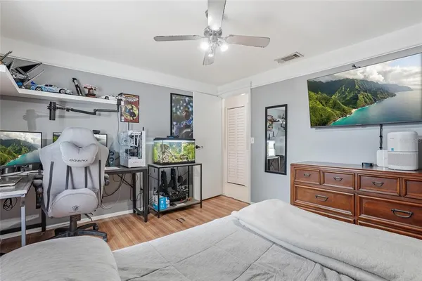 a outdoor living space with furniture and umbrella