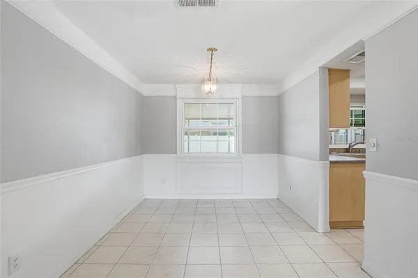 a kitchen with stainless steel appliances granite countertop a stove top oven and sink