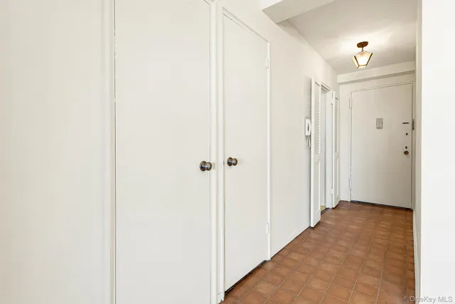 a view of a utility room with wooden floor