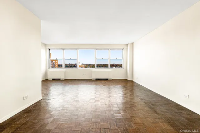 a kitchen with a refrigerator sink and cabinets