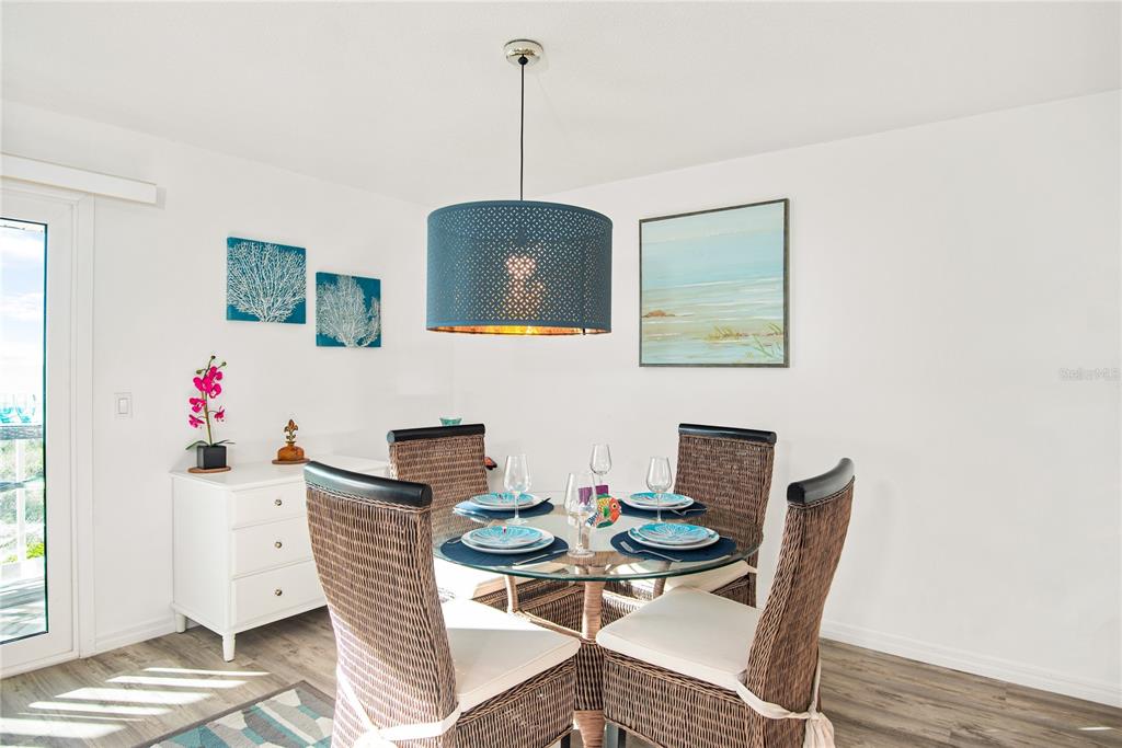 217 Casey Key Road Nokomis, FL 34275 - Photo 15 of 51 a view of a dining room with furniture