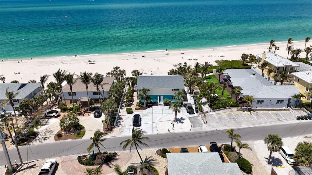217 Casey Key Road Nokomis, FL 34275 - Photo 2 of 51 an aerial view of a house with a swimming pool