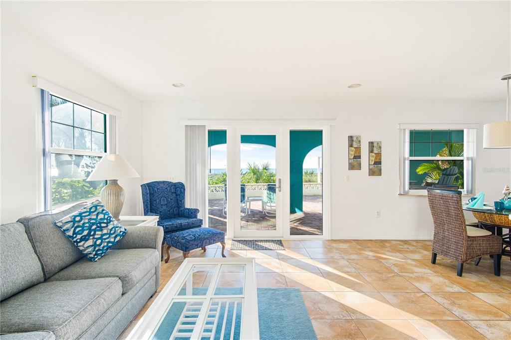 217 Casey Key Road Nokomis, FL 34275 - Photo 42 of 51 a living room with furniture and a large window