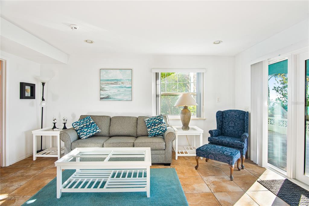 217 Casey Key Road Nokomis, FL 34275 - Photo 43 of 51 a living room with furniture and a rug