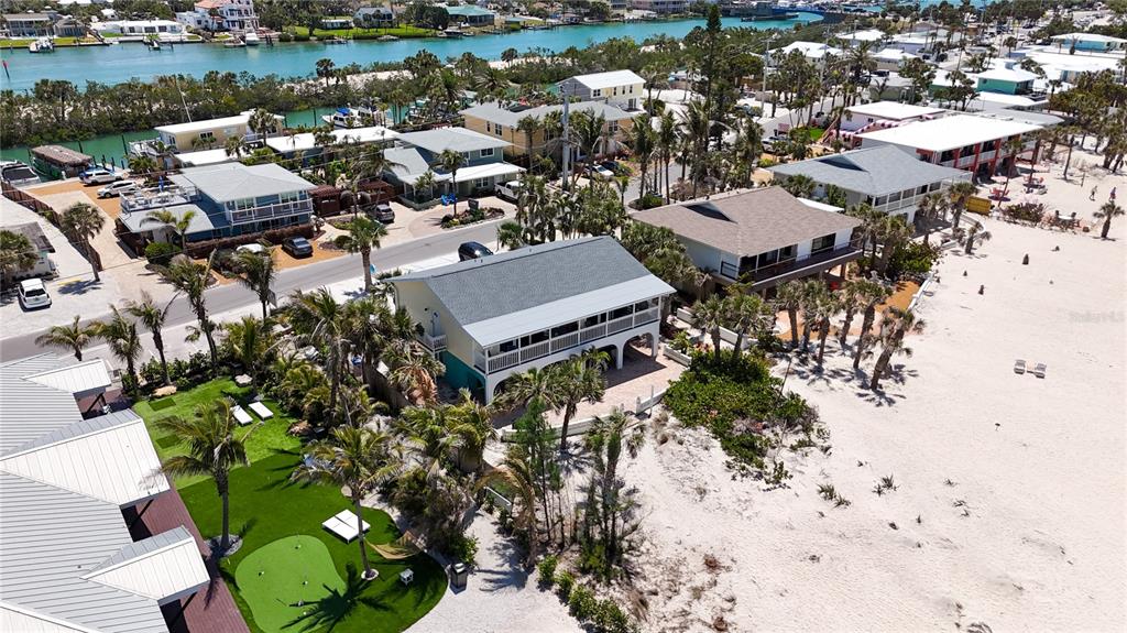217 Casey Key Road Nokomis, FL 34275 - Photo 46 of 51 an aerial view of a house with a yard and lake view