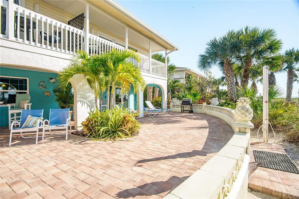 217 Casey Key Road Nokomis, FL 34275 - Photo 7 of 51 a view of a building with a bench