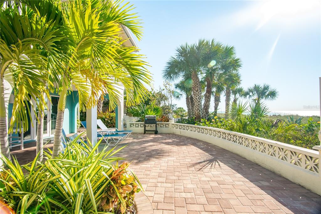 217 Casey Key Road Nokomis, FL 34275 - Photo 9 of 51 a view of a yard with plants and trees