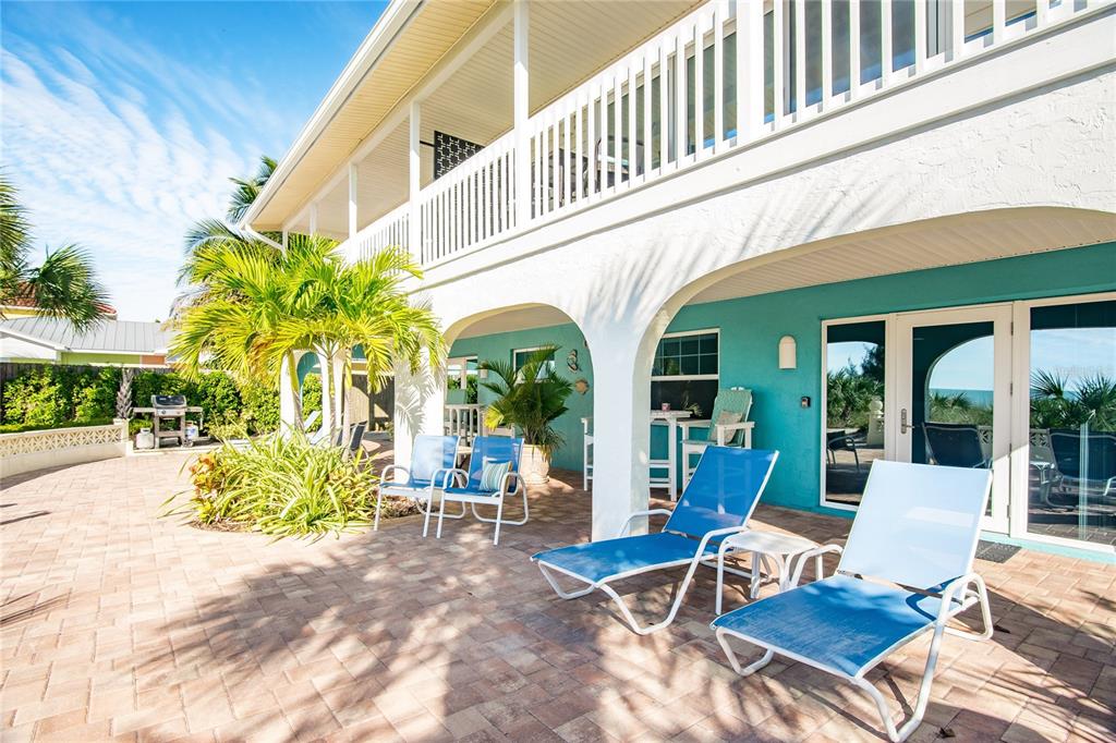 217 Casey Key Road Nokomis, FL 34275 - Photo 10 of 51 a view of a chairs with a patio