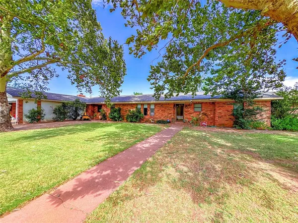 a front view of house with yard