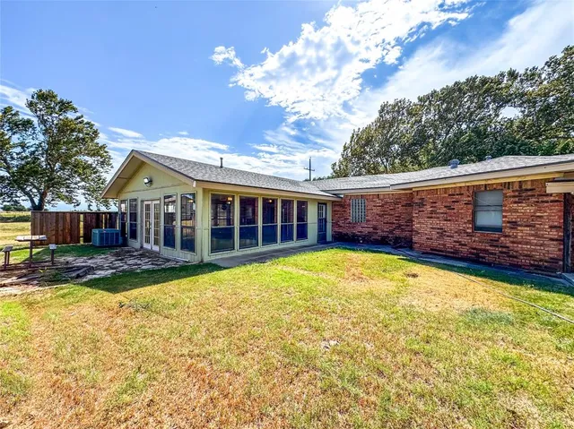 a view of a house with swimming pool