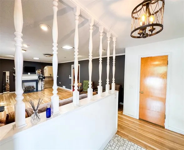 a view of a living room and kitchen view