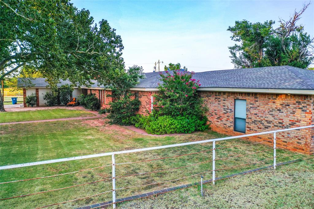 1303 Grand Central Avenue O'Brien, TX 79539 - Photo 40 of 40 a view of a house with a yard and a garden