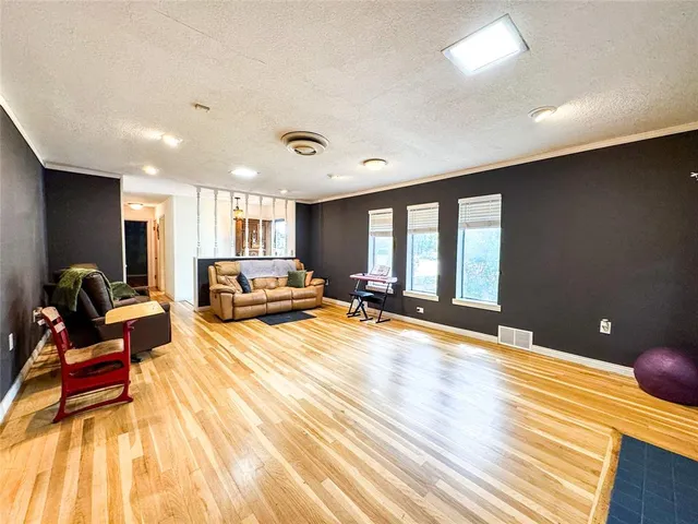 a living room with furniture and a table