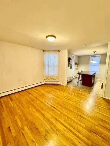 a view of kitchen and kitchen with furniture