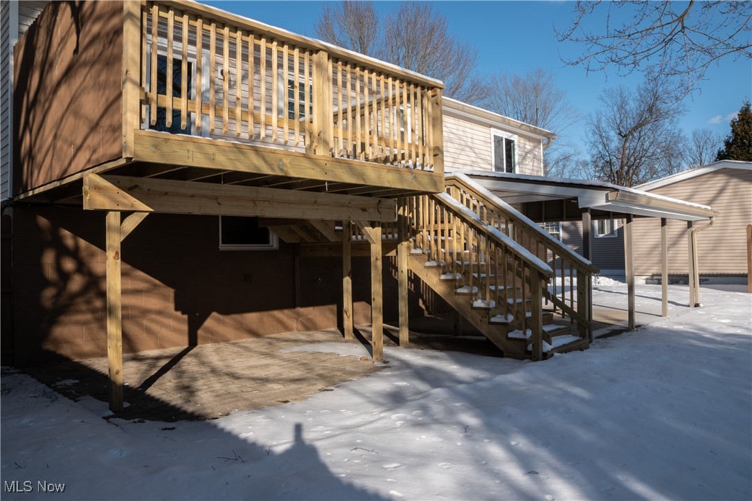 158 Morningside Road Niles, OH 44446 - Photo 31 of 36 Snow covered back of property with a new wooden deck