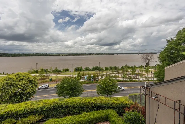 a view of a lake with a city view