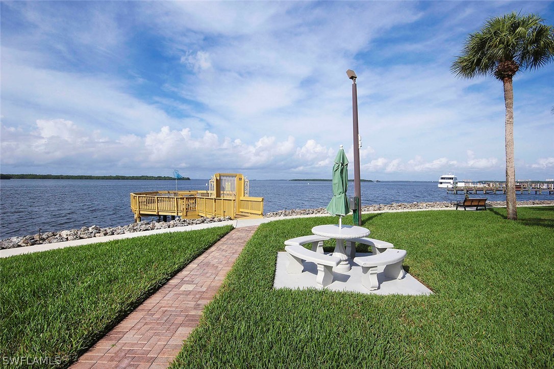 15021 Punta Rassa Road, Unit 602 Fort Myers, FL 33908 - Photo 28 of 35 a view of a garden with a fountain