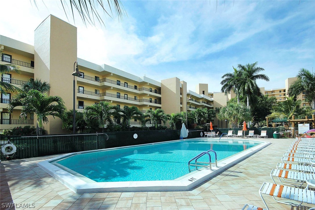 15021 Punta Rassa Road, Unit 602 Fort Myers, FL 33908 - Photo 30 of 35 a view of swimming pool from a patio