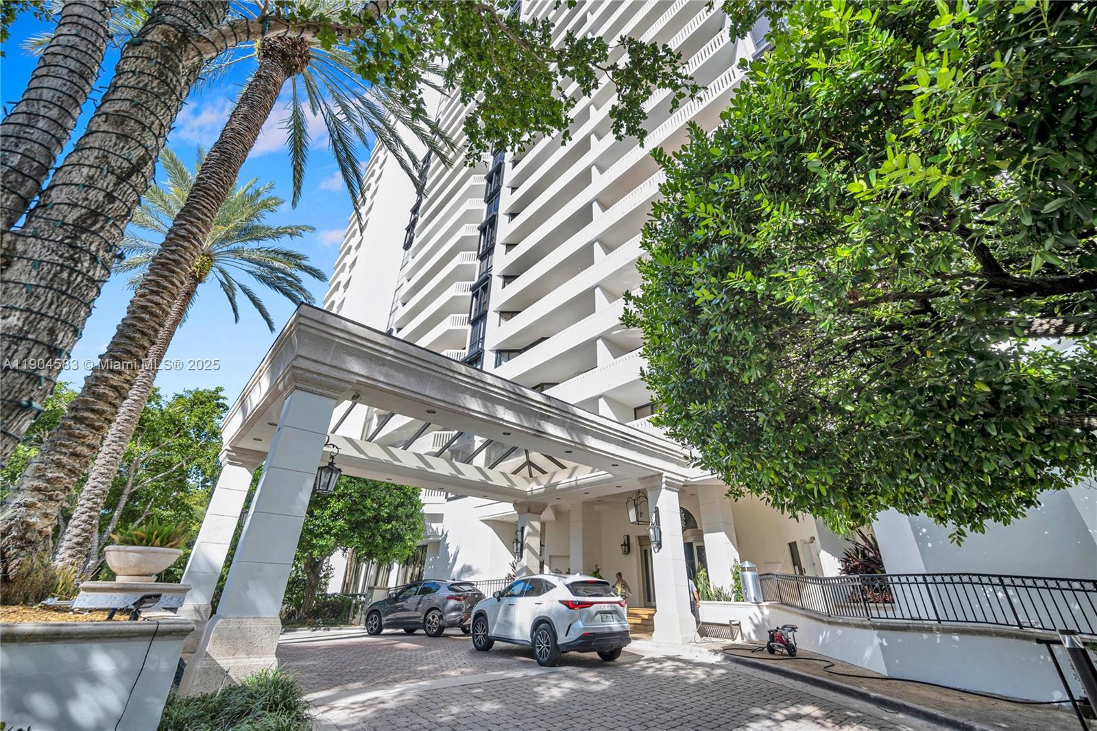 2000 Island Boulevard, Unit 806 Aventura, FL 33160 - Photo 26 of 30 a view of a car park in front of a house