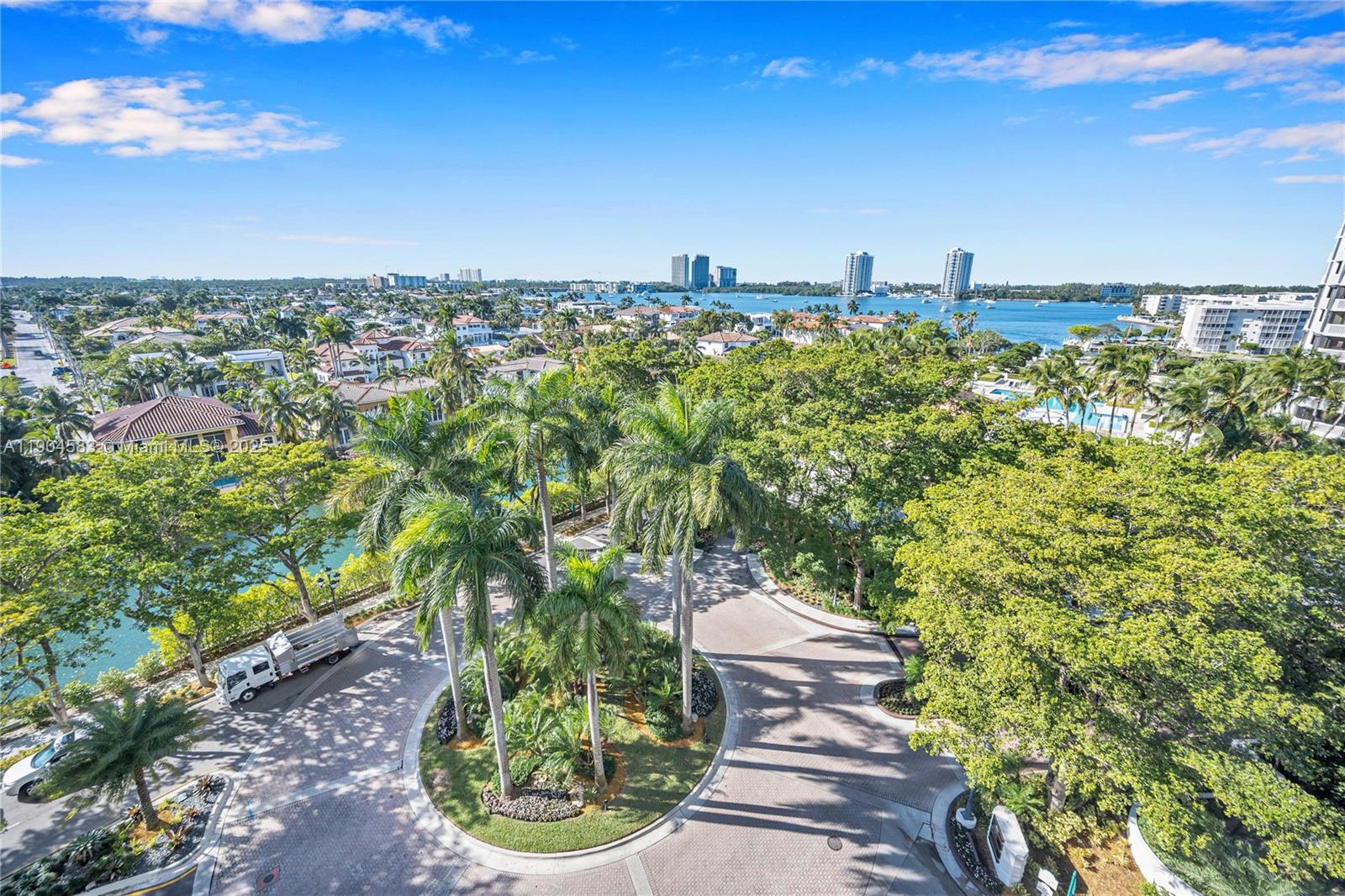 2000 Island Boulevard, Unit 806 Aventura, FL 33160 - Photo 5 of 30 a view of a yard with plants and a bench